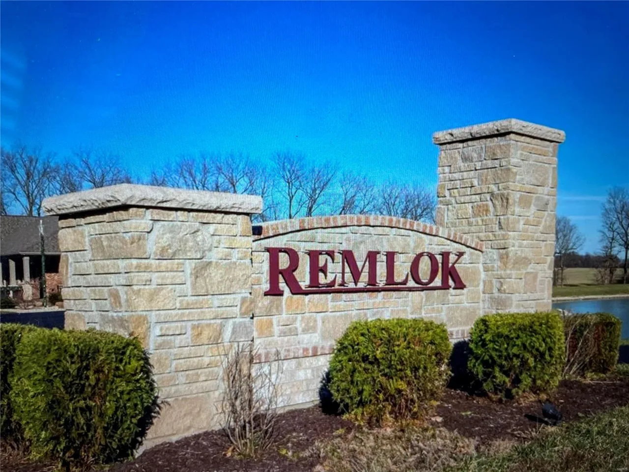 Remlok entrance sign